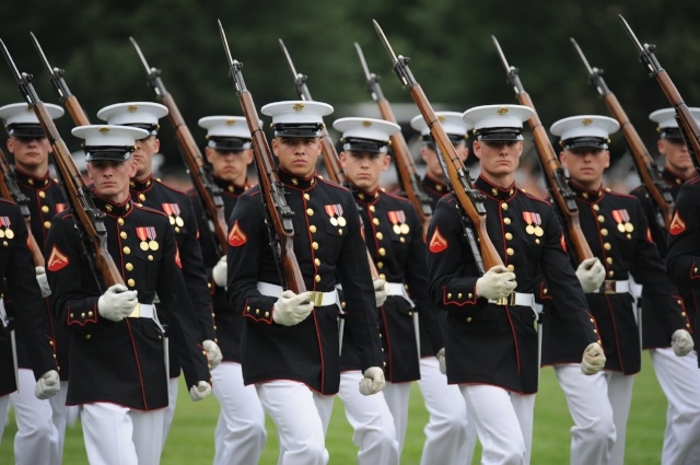 Defense.gov_News_Photo_100615-M-1549W-221_-_U.S._Marines_from_Marine_Barracks_Washington_march_by_during_the_pass_and_review_portion_of_the_Sunset_Parade_at_the_Marine_Corps_War_Memorial_in-507326-edited