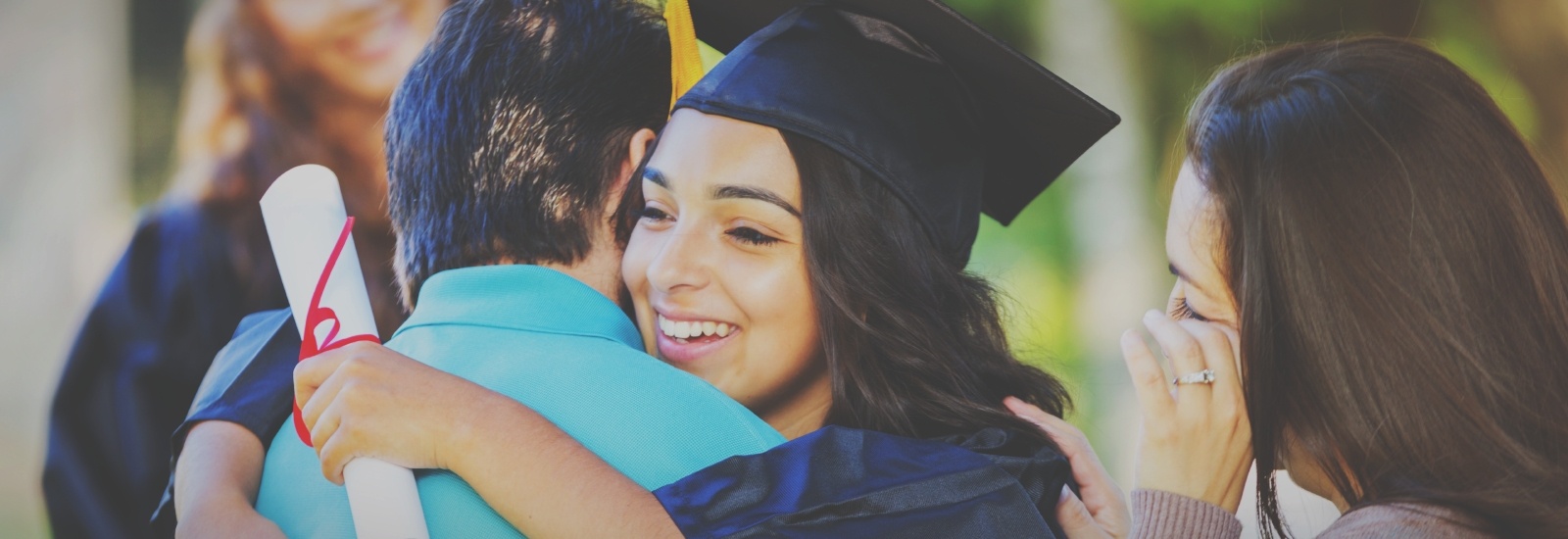 College-graduate-hugs-dad-while-mom-watches-proudly-613884704_5760x3840-768052-edited-3